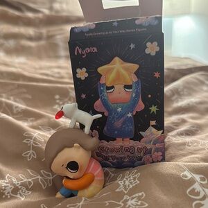 Nyota- Growing Up Figure - Multicolor